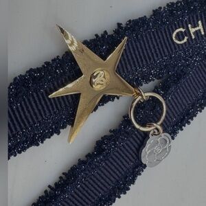NWOT CHANEL Blue Holiday Ribbon with Gold Star and Camellia Flower Charm